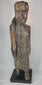 Close-up video highlighting the carved facial features, inset eyes, and aged surface of a Dayak ancestral sculpture