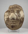 360-degree video of an ancient Egyptian stuccoed mud-and-straw funerary face fragment, showing surviving facial features, exposed plant-fibre construction, surface losses, and old collection label, formerly from the Dr. Bruce L. Ralston collection.