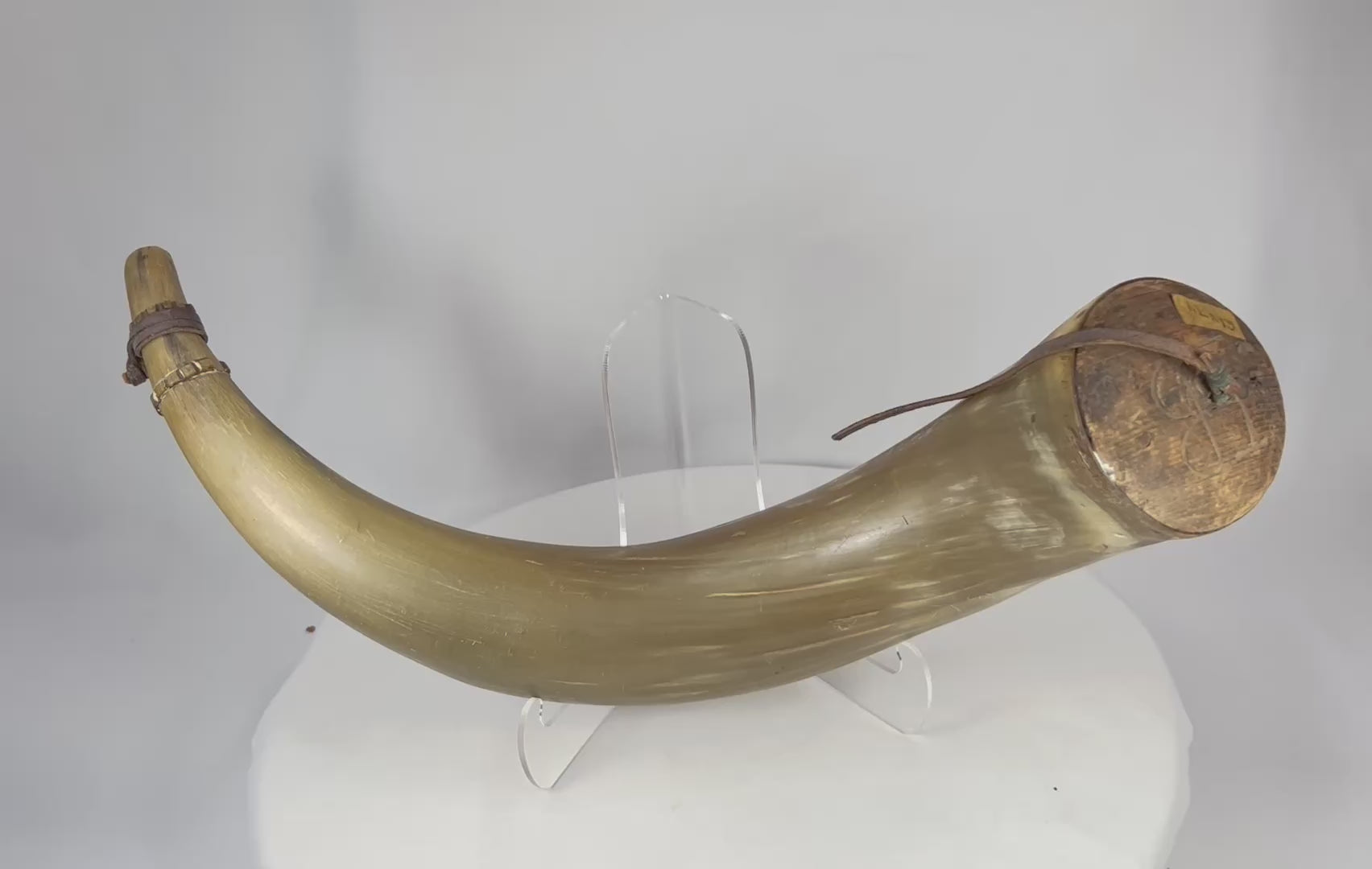 360-degree view of antique priming powder horn with carved initials IB
