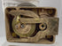 view of antique safe lock mechanism back showing internal components and original back plate