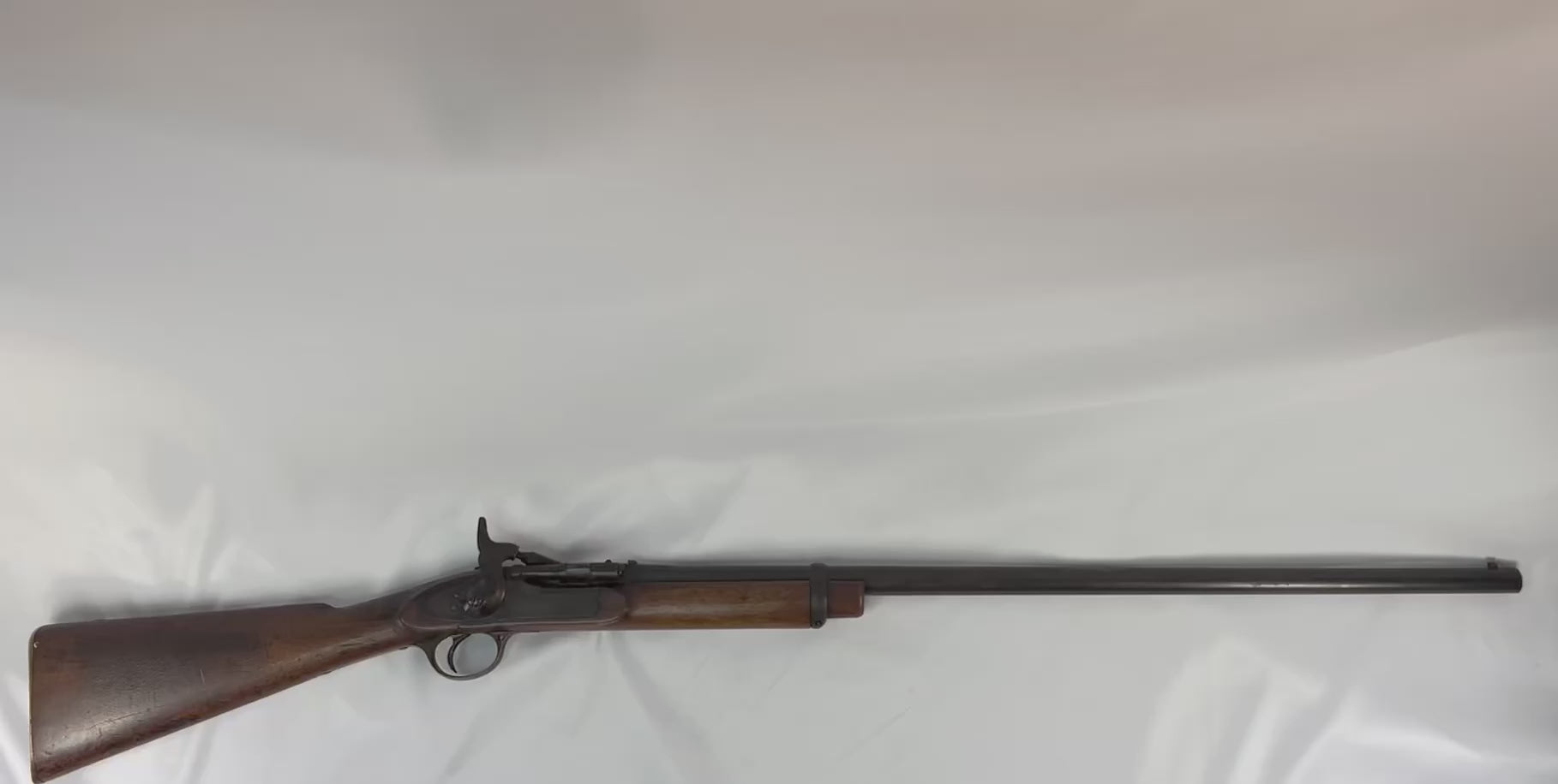 Antique British Snider-Enfield Pattern 1853 Mark II service rifle, dated 1864, breech-loading conversion, steel and brass fittings, walnut stock with Victorian-era military patina, non-firing collectible