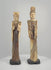 Rotating video of a matched pair of vintage Chinese carved-bone Emperor and Empress figurines, mid-to-late 20th century, featuring elaborate headdresses, expressive facial details, flowing imperial-style robes, decorative accessories, contrasting cream and dark-brown surfaces, and individual black display bases.