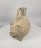 Ancient Yortan Culture terracotta pig-shaped zoomorphic vessel from Northwestern Anatolia displayed in a rotating 360-degree view, highlighting the tripod legs, arched stirrup handle, projecting snout, traces of white slip, archaeological patina, and Early Bronze Age craftsmanship.