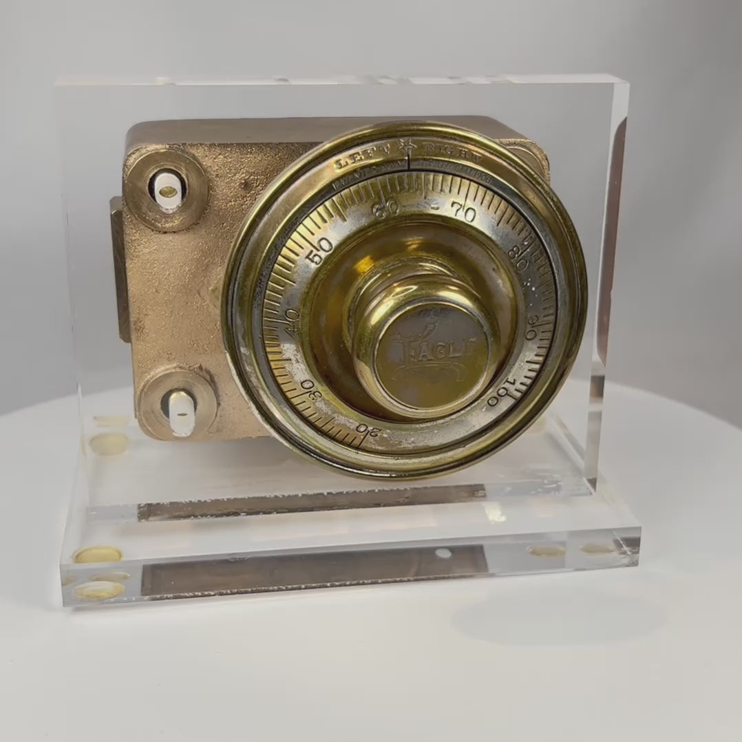 360 degree rotating view of antique Eagle safe lock mechanism front with brass combination dial