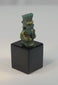 360-degree view of an ancient Egyptian blue-green faience amulet depicting the protective dwarf deity Bes from the Late Period to Ptolemaic era.