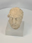 Rotating view of an ancient Gandharan limestone head fragment traditionally identified as Bodhisattva Maitreya, highlighting its weathered facial features, archaeological surface, Kushan Period craftsmanship, and Greco-Buddhist artistic influences from the Silk Road region.