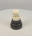 Rotating video of an Indian Lion Capital of Ashoka miniature showing four carved lions, wheel motifs, and the tiered ebonized wood base.