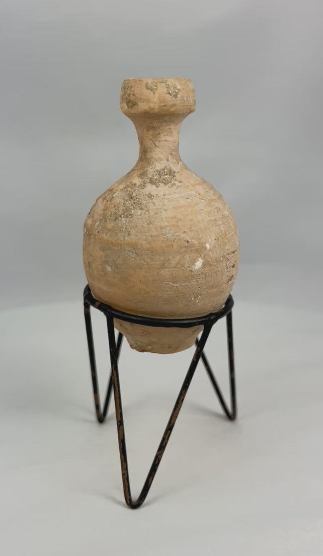 Ancient Roman terracotta oil vessel 360-degree view showing complete form, rounded body, short neck, and authentic burial patina from the 1st–3rd century AD.
