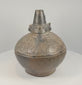 Rotating 360-degree video of a Sicán Lambayeque blackware vessel, circa 750–1375 AD, showing its complete form, burnished ceramic surface, base, opening, and aged details.