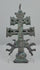 360-degree rotating view of an antique Spanish Caravaca bronze crucifix pendant, attributed to the 17th century. Features a double-barred cross with the crucified Christ, two winged angels, intricate religious imagery on both sides, traces of historic silvering, and a richly aged green and brown patina.