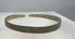 Rotating view of an ancient Western Asiatic penannular bronze bracelet with a flat-section band, stylized animal-head terminals, incised hatched decoration, pointillé triangles, annulet motifs, tapered ends, and green, blue-green, brown, and earthen archaeological patination