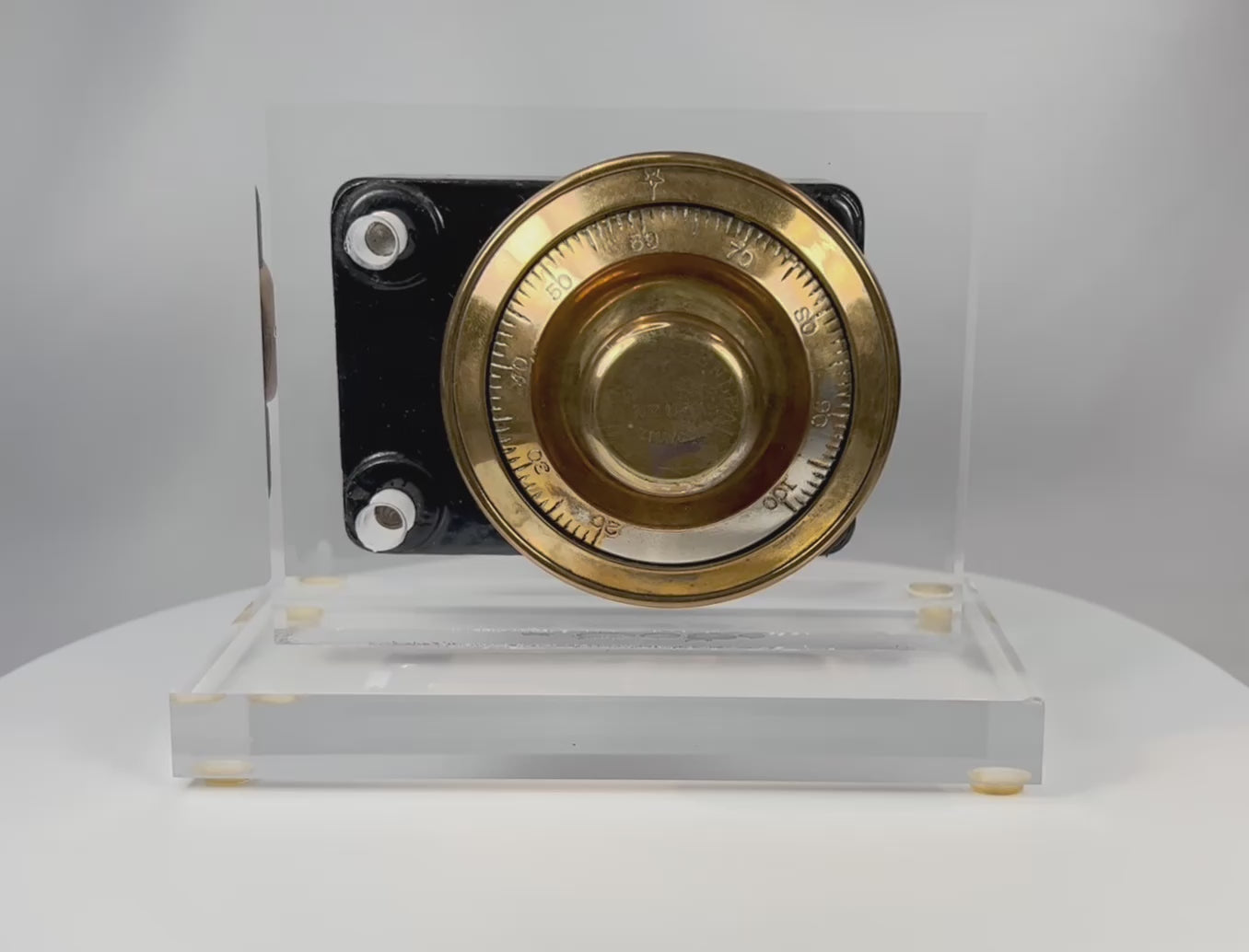 360 degree rotating view of antique Sargent and Greenleaf safe lock mechanism front with brass dial
