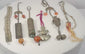 Video presenting six antique Chinese chatelaine, amulet and garment ornaments with silver-alloy metalwork, beads, bells and textile tassels