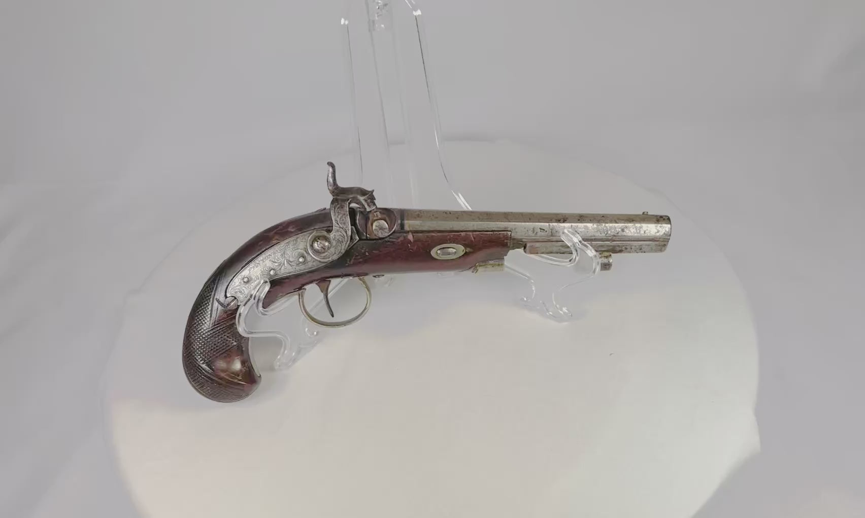 19th-century Fenton London .62 caliber percussion pistol with octagonal barrel, ornate hand-engraved lock and hammer, walnut stock with checkered grip, fine example of English gunsmithing, circa 1840–1860