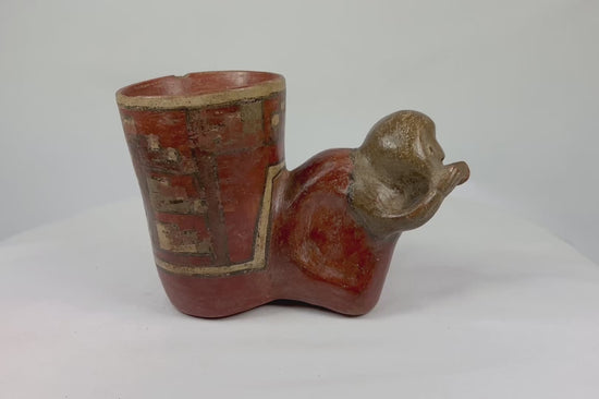 Rotating view of ancient Nicoya effigy vessel with polychrome decoration and anthropomorphic head spout