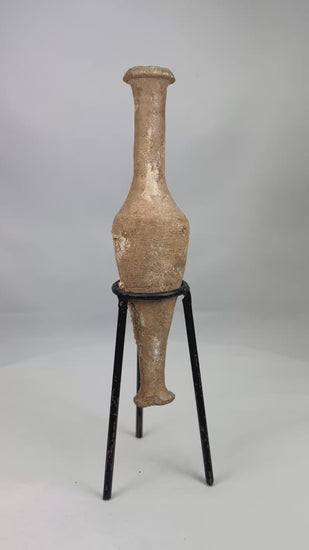 360-degree interactive view of an authentic Roman Imperial terracotta unguentarium showing elongated spindle body, narrow neck, flared rim, and natural earthen patina