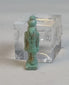 Rotating video of an ancient Egyptian blue-green faience falcon-headed Horus amulet.
