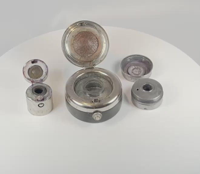 360-degree rotating view of antique portable writing set with multiple inkwell containers and metal lids