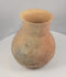 Rotating presentation of an ancient Pre-Columbian Central American earthenware vessel with a globular body, tall neck, flared rim, and visible restoration