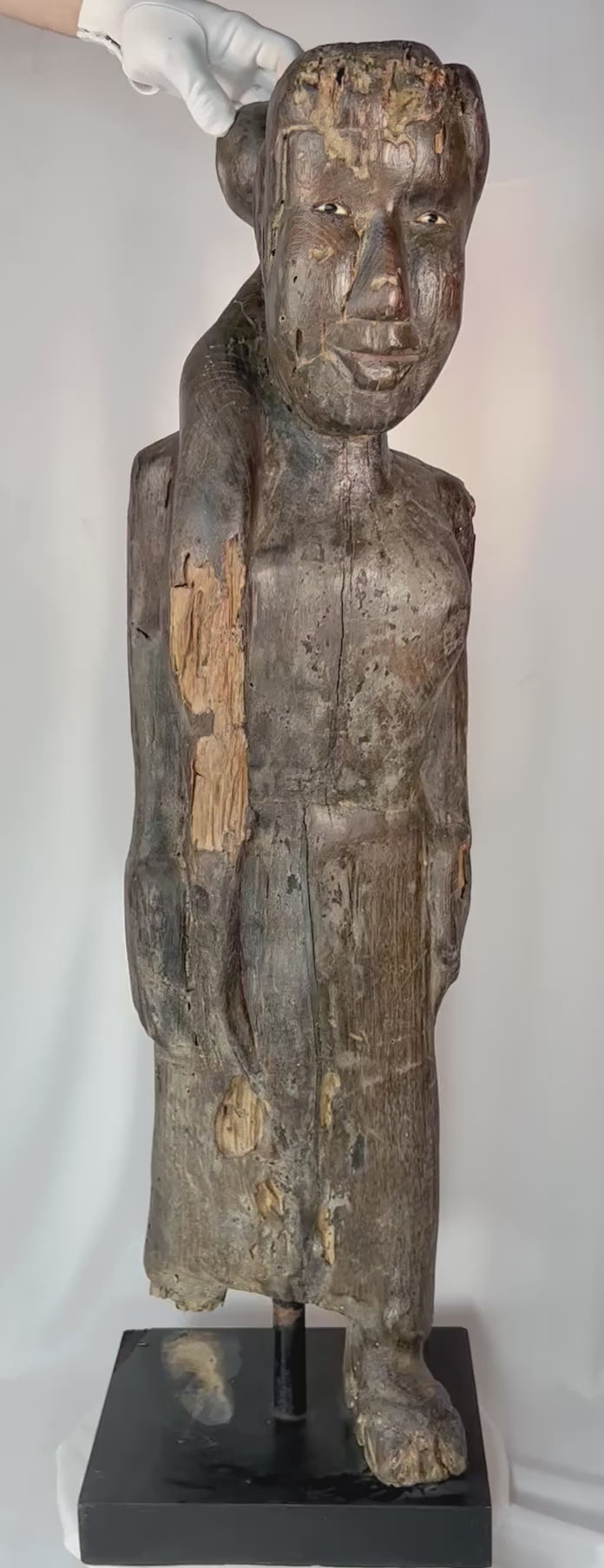 360-degree view of an antique Dayak ancestral wooden figure from Borneo showing full form and aged patina