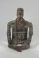 360° rotation of ancient terracotta shaman figure showing red beaded necklaces and detailed surface patina.