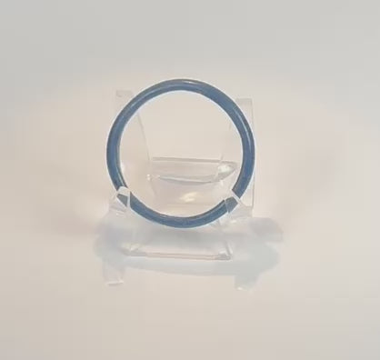Rotating view of an ancient Roman cobalt-blue glass bracelet, highlighting its complete circular form, vibrant coloration, archaeological wear, and craftsmanship from the Roman Imperial Period, circa 1st–4th century AD