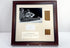 Video view of the framed linen fragments attributed to Manchester Mummy 1770, showing the investigation photograph, handwritten inscription and identification panel.