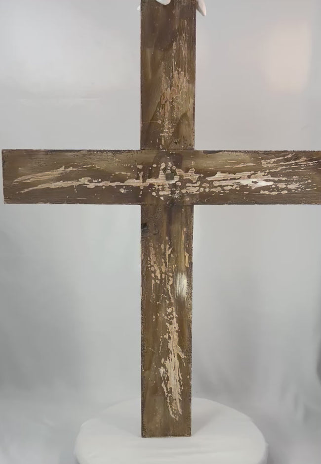 180-degree rotating view of an antique Spanish Colonial folk devotional crucifix with expressive carved Christ figure and aged patina.