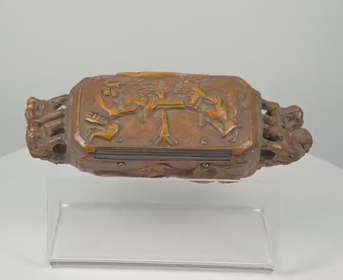 360-degree video of a late 19th-century Italian carved wood table snuff box featuring a hunting scene, mythological figures, beast-form handles, and a handwritten Rome 1912 provenance label.