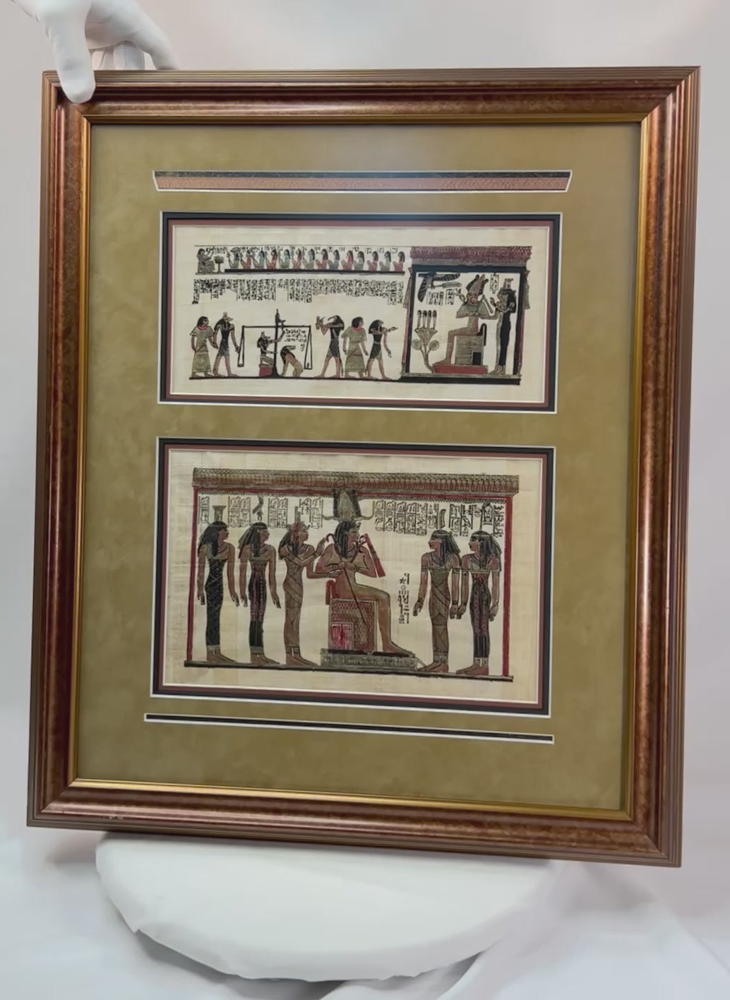 Framed Ancient Egyptian papyrus artwork depicting ritual and funerary scenes with deities and hieroglyphs, double-matted in gold and black frame, modern reproduction on papyrus