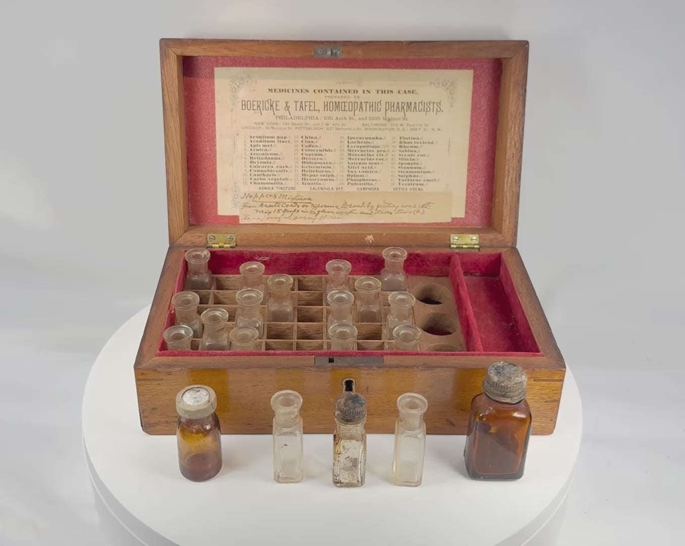 360-degree rotating video of a late 19th-century Boericke & Tafel homeopathic medicine chest with glass bottles