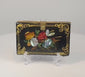 Video showcasing the Victorian black lacquer papier-mâché calling card case with mother-of-pearl floral inlay, gilt decoration, and brass clasp