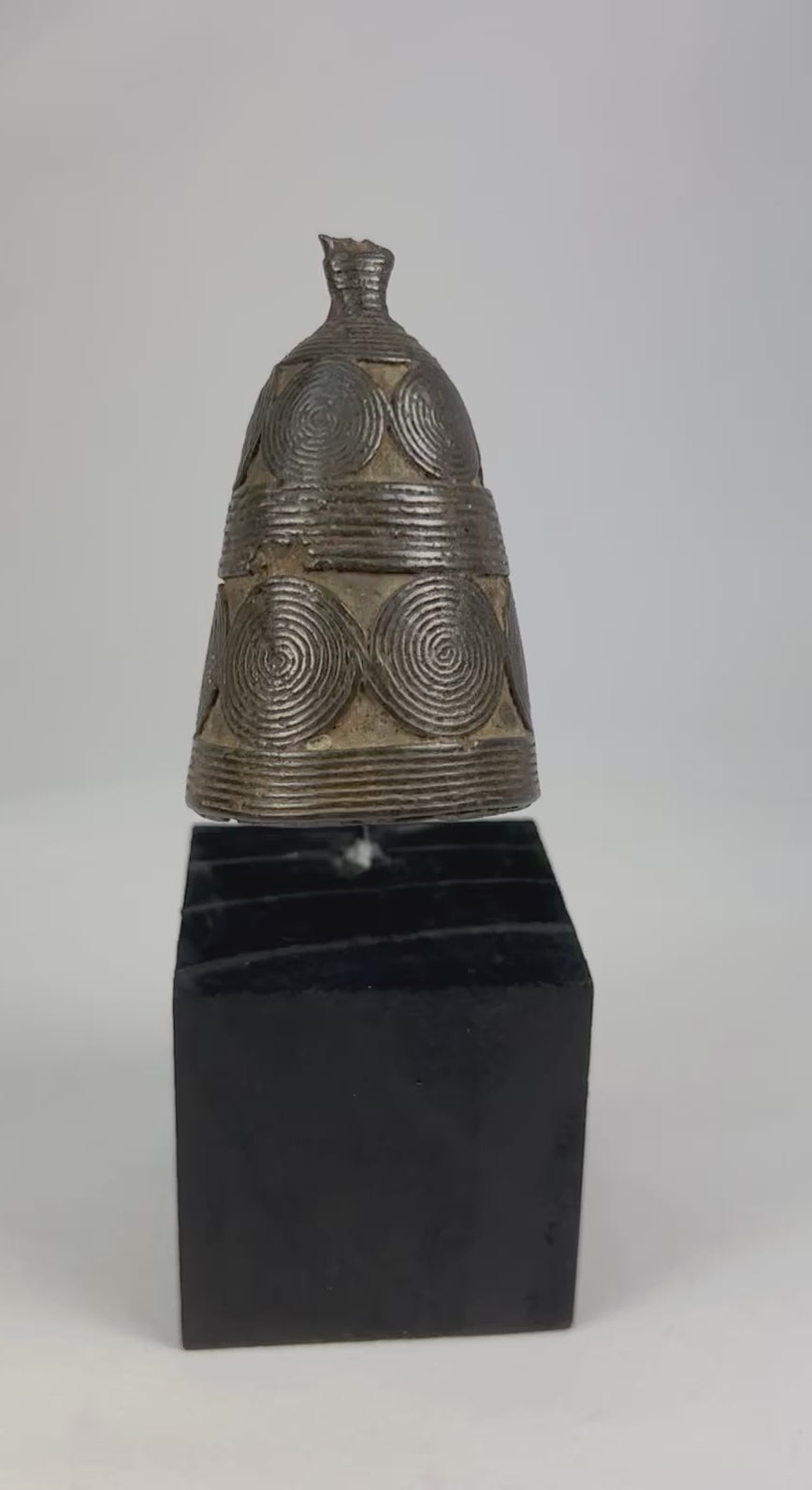 Late 19th–early 20th century Tibetan Buddhist bronze ritual bell (ghanta) with lotus petal base, vajra-finial handle, original iron clapper, dark patina from ritual use, used in Vajrayana ceremonies