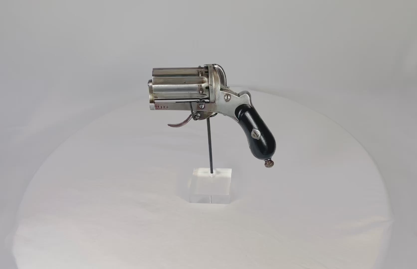 Mid-19th century Meyers Pepperbox Pinfire Revolver, double-action multi-barrel design with folding trigger, left-side loading gate, wood grip panels, marked with Belgian Liège proof stamps, compact 4.5-inch antique firearm, circa 1860, collectible historical weapon