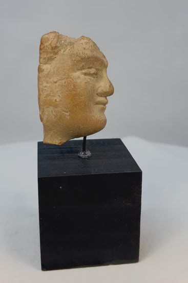 360-degree rotating view of ancient Classical terracotta portrait fragment on museum stand