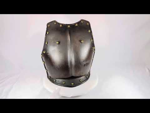 17th-century French cuirassier armor set with brass-studded breastplate and matching backplate, 16 in x 15 in, featuring inner linen lining with leather trim, battle wear and patina visible, historically used in European cavalry warfare.