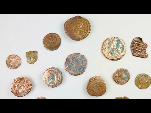 Collection of 16 ancient Roman and Byzantine bronze coins, circa 2nd–7th century AD, featuring worn imperial busts, Christian symbols, and reverse motifs; varied sizes and patinas with green oxidation and surface wear, representing authentic currency circulation across late antiquity and the early Byzantine Empire.