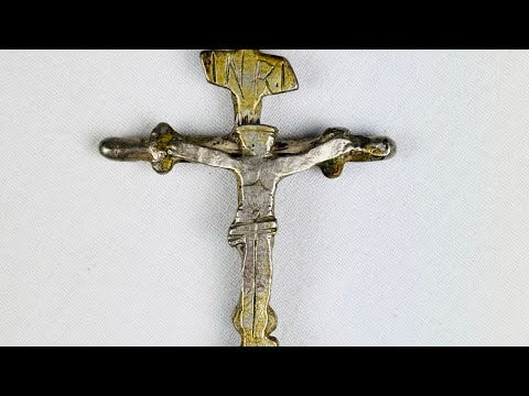 Antique silver crucifix pendant, circa 1780–1820, with sculpted Christ figure, INRI inscription, baroque-inspired detailing, and remnants of gilding. Southern European devotional piece used in Catholic ritual and personal devotion.