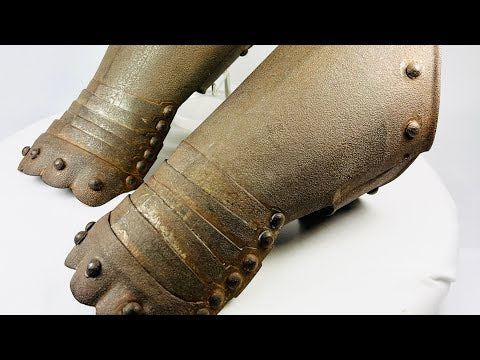 air of Gothic-style steel gauntlets, likely 16th–17th century style, featuring riveted plates, flared cuffs, and subtle etched detailing; aged patina and hand-forged construction evoke authentic European medieval armor craftsmanship, once used for hand and wrist protection in battle or ceremonial display.