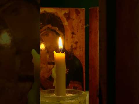 Video of antique Greek Orthodox icon of Christ Pantocrator illuminated by candlelight, symbolizing sacred devotion and centuries of spiritual tradition — Relic and Rarity.