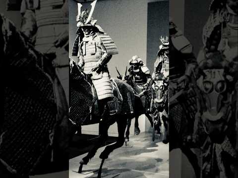 Video showcasing Edo–Meiji period Japanese lacquered samurai stirrups with cross-in-circle mon, exploring the legacy and artistry of authentic samurai relics from Relic & Rarity.