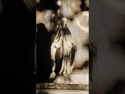 video of Spanish Colonial Madonna and Child statue, showcasing original polychrome paint, gilding, and aged wooden socle, late 18th–19th century.