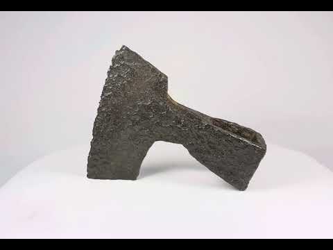 Ancient medieval iron axe head with broad bearded blade and hollow socket, Viking and early European design, circa 10th–14th century CE.