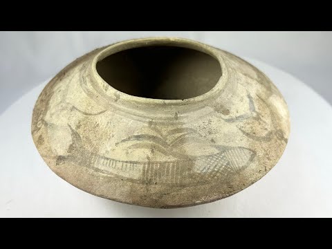 Ancient Indus Valley terracotta bowl, 2nd millennium BCE, decorated with painted fish motifs. Rare prehistoric ceramic with geometric and aquatic designs, reflecting early riverine culture and symbolism in South Asian civilization.