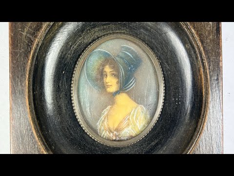 Antique 19th-century Viennese miniature portrait of a woman in blue bonnet and lace gown, painted in gouache on wafer, in original ebonized wooden frame with convex glass.