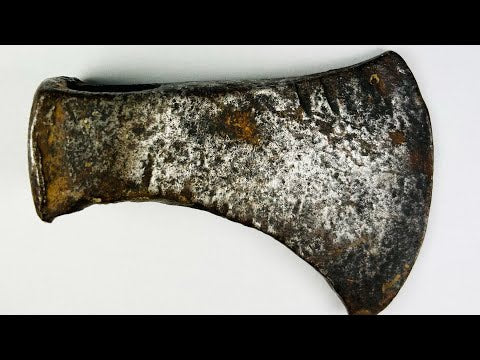 360° rotating view of a 19th-century frontier-era hand-forged iron axe head, showcasing tapered cutting edge, forged eye socket, patina, and historical craftsmanship.