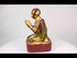 360-degree view of a 19th-century Burmese gilded monk statue with gold leaf and lacquered finish, shown in full rotation.
