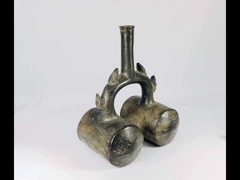 Authentic Pre-Columbian Chimu greyware stirrup vessel, circa 900–1470 CE, featuring double chambers, sculpted spouts, and dark burnished surface.