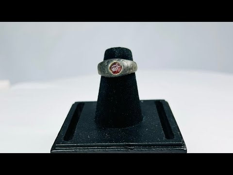 Ancient Sassanian silver ring with polished carnelian intaglio gemstone featuring engraved design, circa 224–651 CE, used as both personal adornment and functional seal.