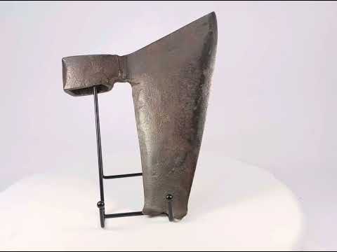 360-degree view of an early 19th-century European goosewing fishtail axe, highlighting the forged iron blade, fishtail profile, and aged patina